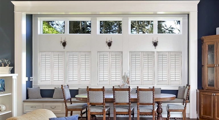Jacksonville great room with white plantation shutters.